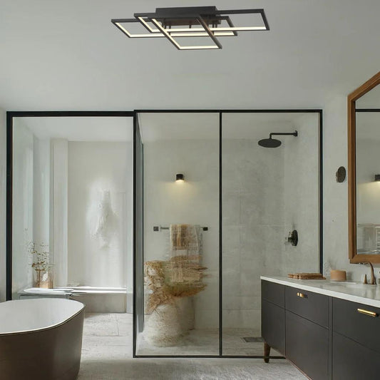 Black flush-mount ceiling light, by Maple, for hallway, bedroom, or entryway, angled view