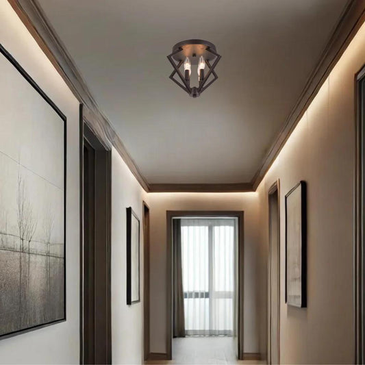 Iron with orb flush-mount ceiling light, by Maple, for hallway, bedroom, or entryway, angled view