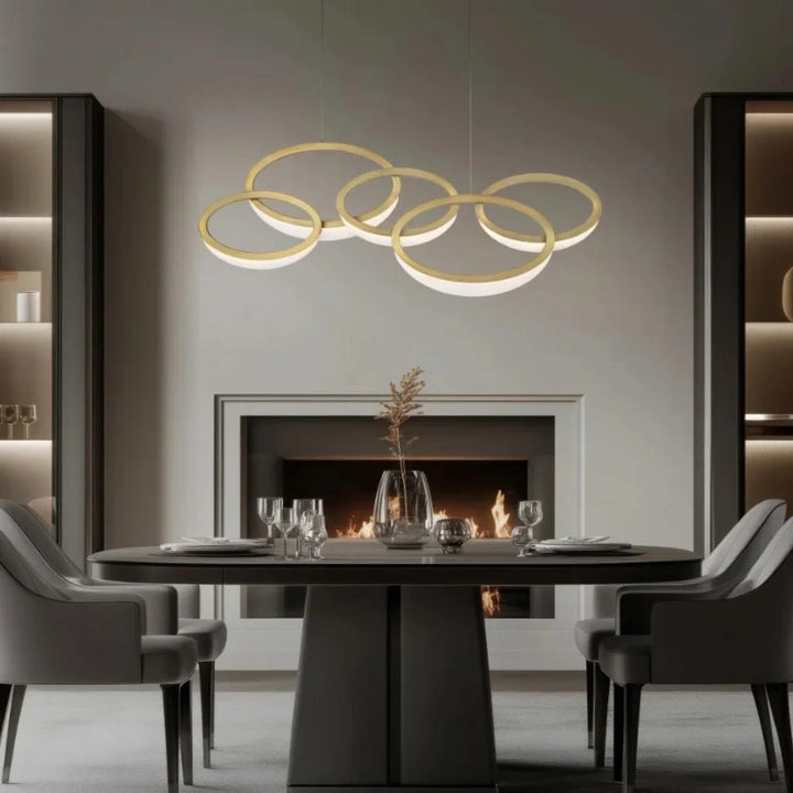 Aged brass finish chandelier, by Modern Forms, angled view