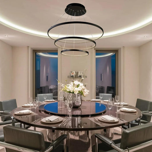 Matt black chandelier, by Maple, angled view