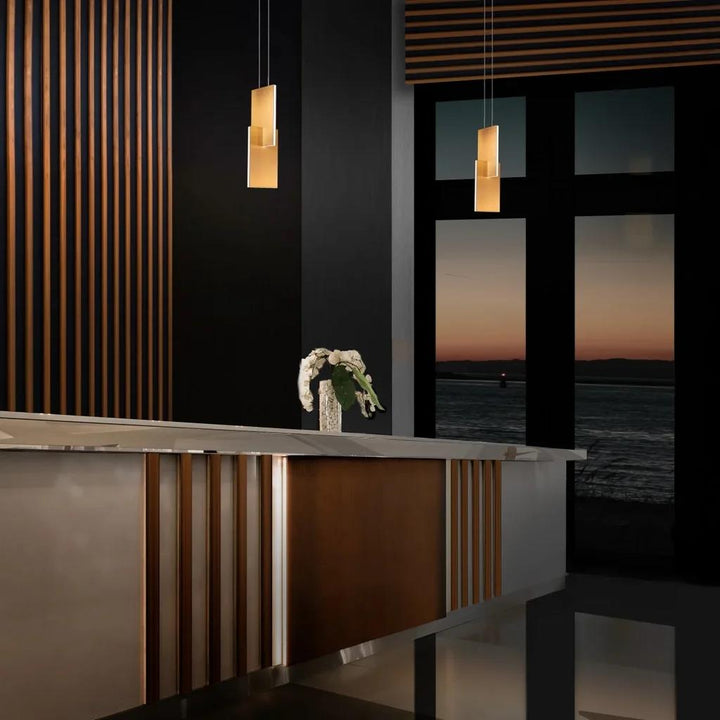 Aged brass finish chandelier, by Modern Forms, angled view