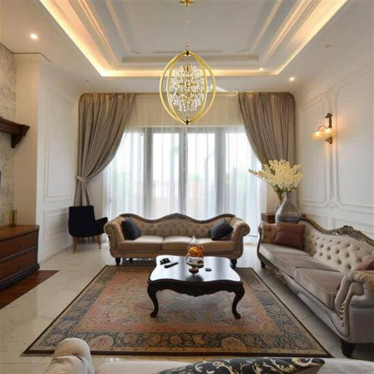 Gold metal +clear crystal chandelier, by Maple, angled view