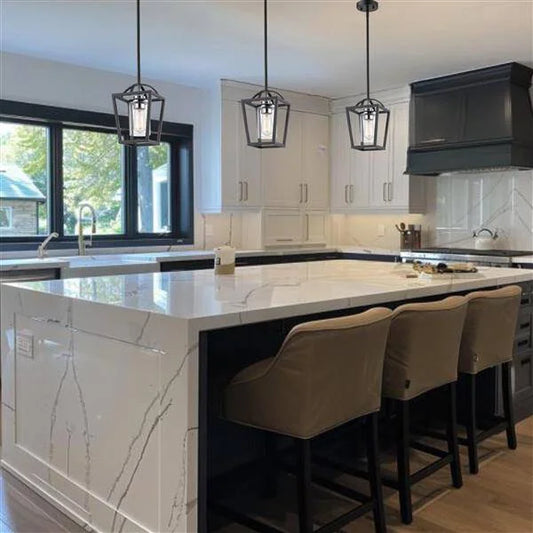 Black & chrome + clear glass pendant light, by Maple, for kitchen island or dining, angled view