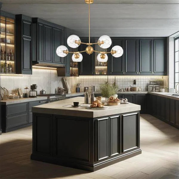 Gold + clear glass pendant light, by Maple, for kitchen island or dining, angled view