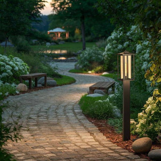 Black outdoor post lantern, by Maple, for driveway or front yard, angled view