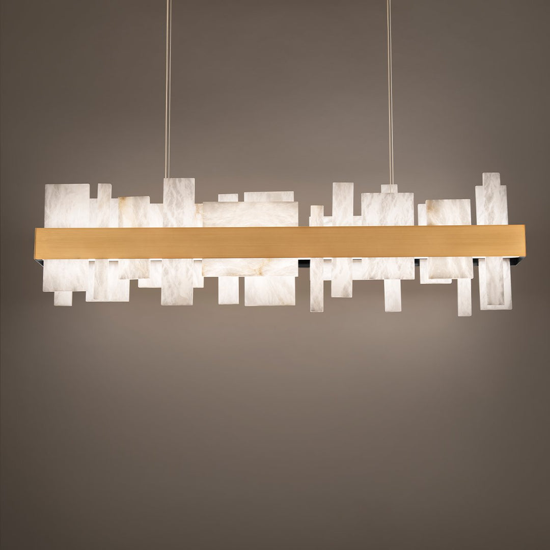 Linear dining island pendant light with three glass shades for even illumination.