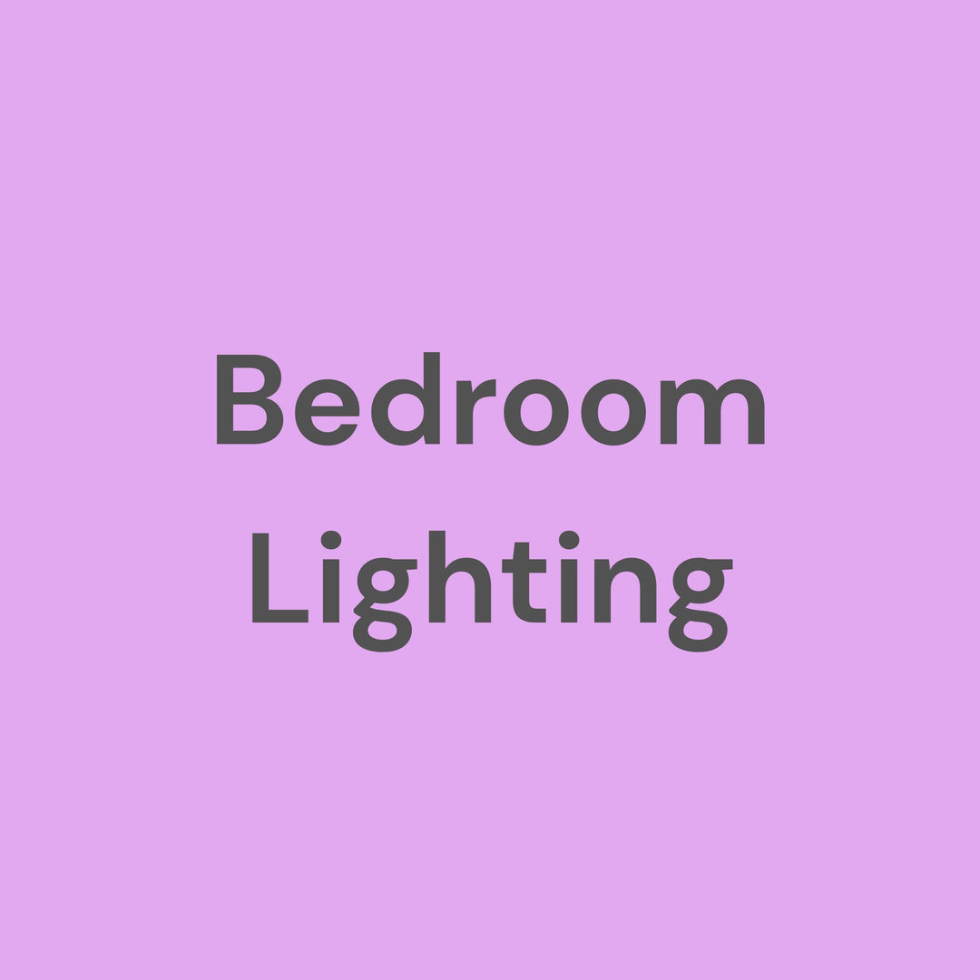 A cozy bedroom lighting collection featuring elegant bedside lamps with fabric shades and brushed nickel bases, designed to create a warm and inviting ambiance for relaxation and comfort.