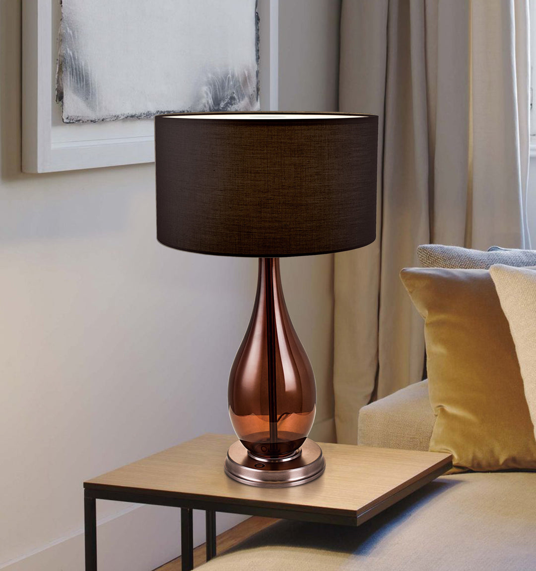 Modern table lamp with ceramic base and fabric shade, available on special.