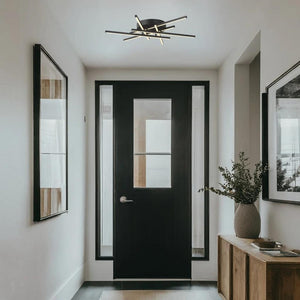 Black flush-mount ceiling light, by Maple, for hallway, bedroom, or entryway, angled view