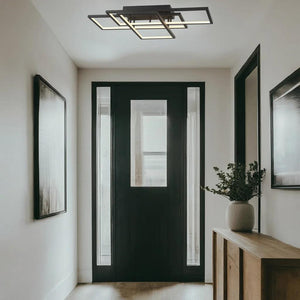 Black flush-mount ceiling light, by Maple, for hallway, bedroom, or entryway, side view