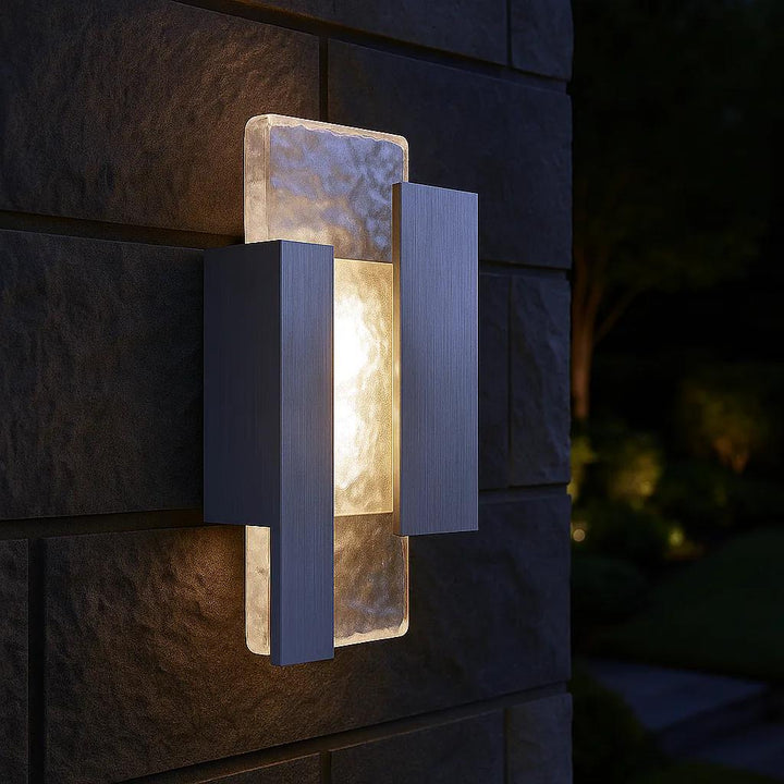 Brushed aluminum wall sconce, by Quoizel, for hallway or living room, angled view