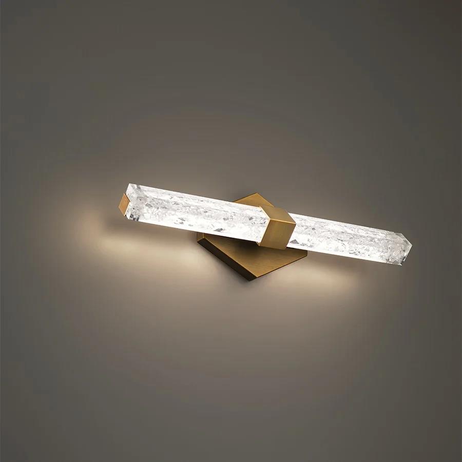 Aged brass finish vanity light, by Modern Forms, for bathroom