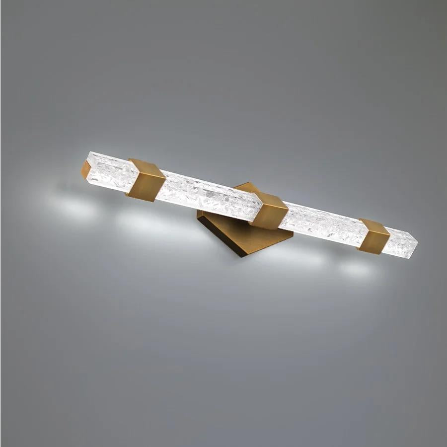 Aged brass finish vanity light, by Modern Forms, for bathroom