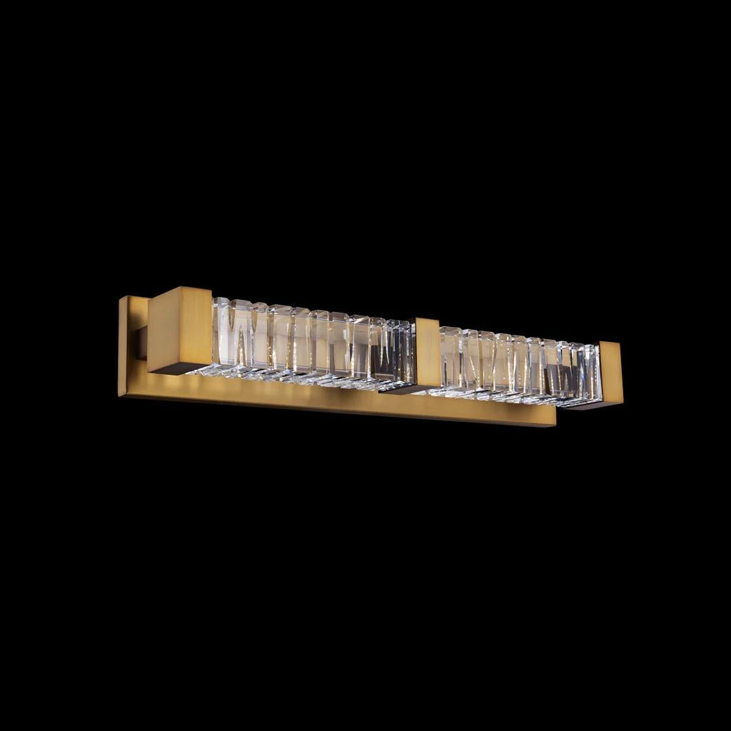 Aged brass vanity light, by Schonbek, for bathroom