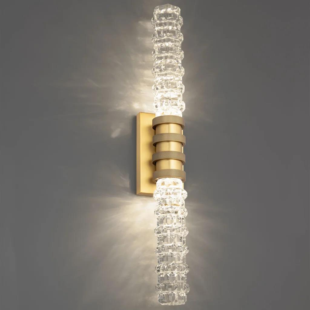 Aged brass vanity light, by Schonbek, for bathroom