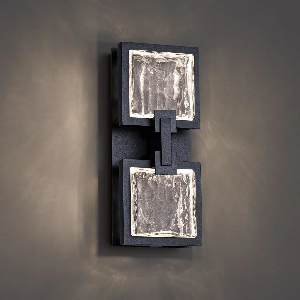 Black wall sconce, by Schonbek, for hallway or living room