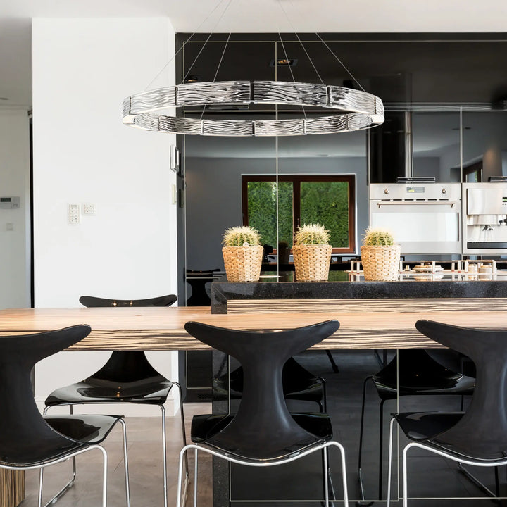 Polished nickel finish chandelier, by Modern Forms, angled view