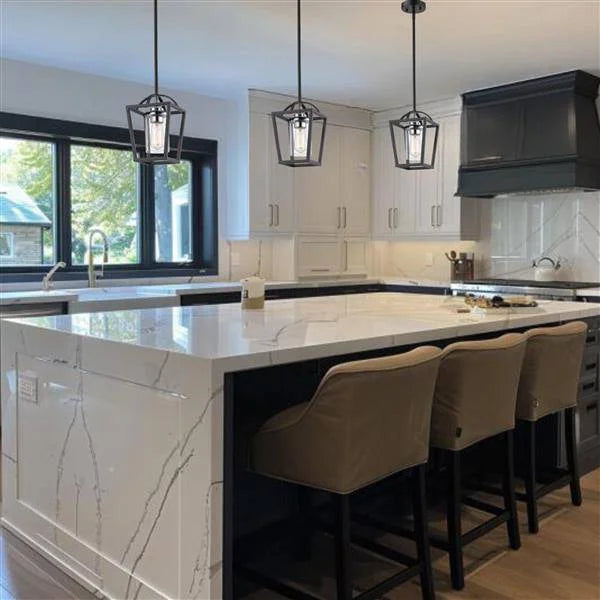 Black & chrome + clear glass pendant light, by Maple, for kitchen island or dining, angled view