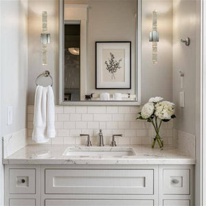 Chrome vanity light, by Maple, for bathroom, angled view